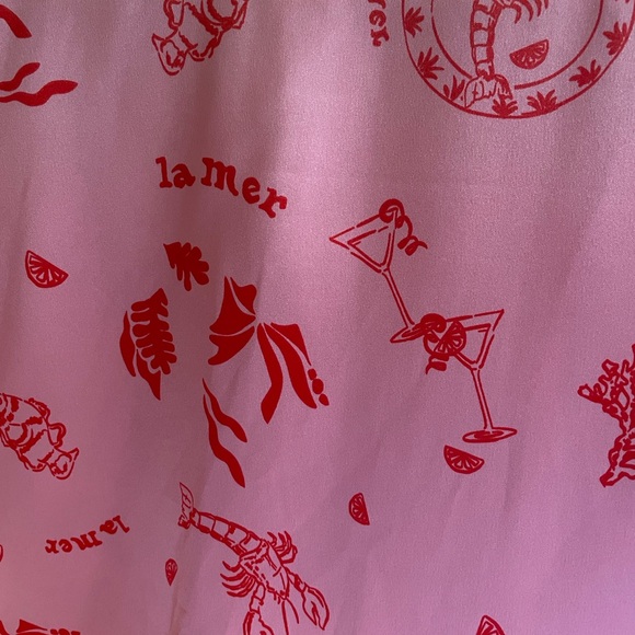 Never Fully Dressed
Pink La Mer May Midi Dress Size 14. - Picture 16 of 16